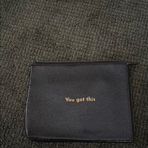Black Pouch with Gold Text